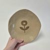 Ceramic plate in beige