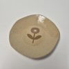 Ceramic plate in beige