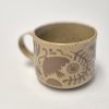 Ceramic sgraffito mug in brown