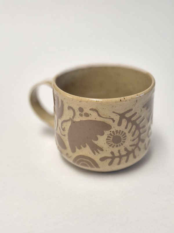 Ceramic sgraffito mug in brown