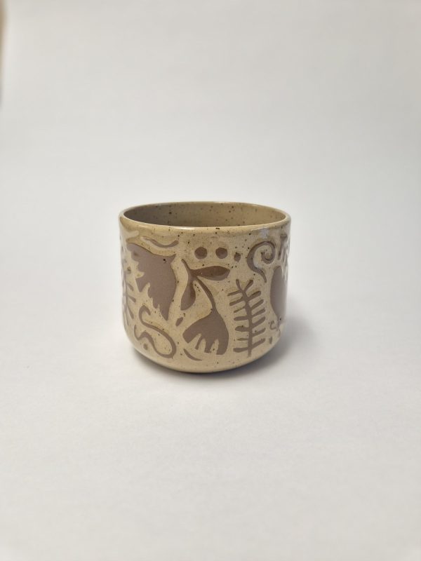 Ceramic sgraffito mug in brown