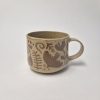 Ceramic sgraffito mug in brown