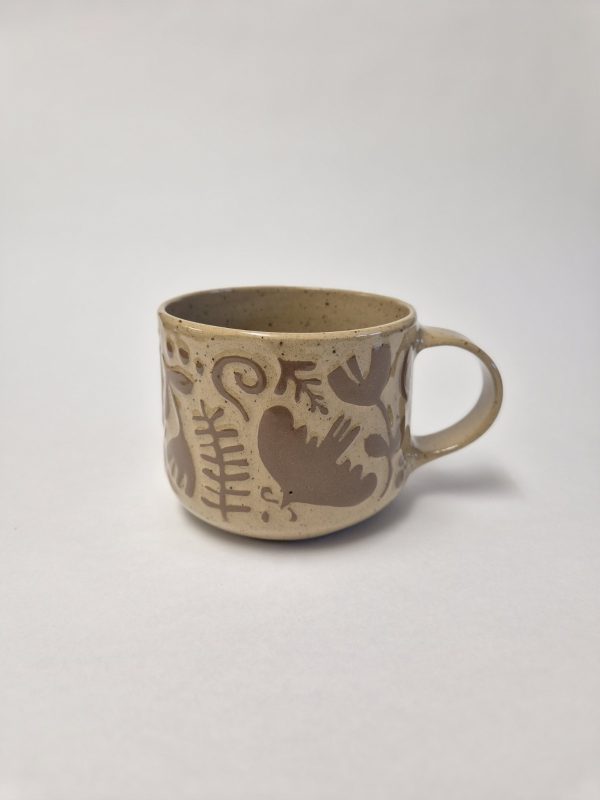 Ceramic sgraffito mug in brown