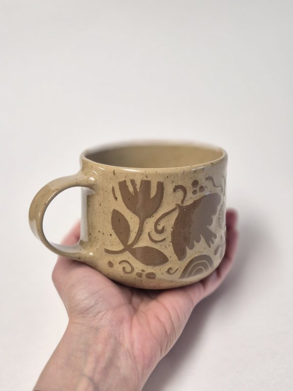 Ceramic sgraffito mug in brown