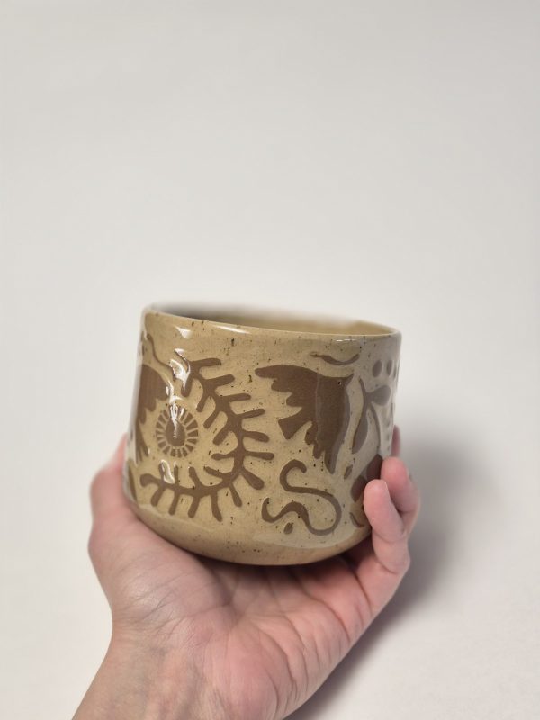 Ceramic sgraffito mug in brown