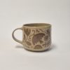Ceramic sgraffito mug in brown
