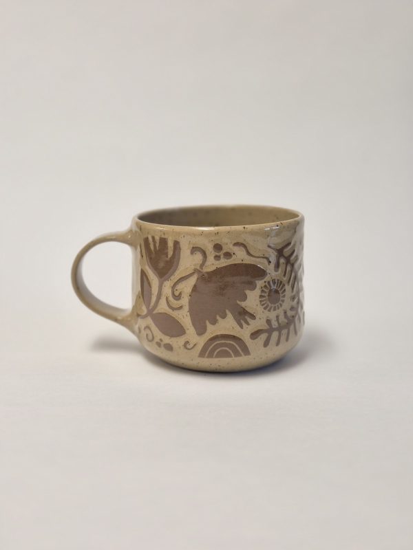 Ceramic sgraffito mug in brown