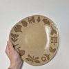 Ceramic service plate