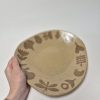 Ceramic service plate
