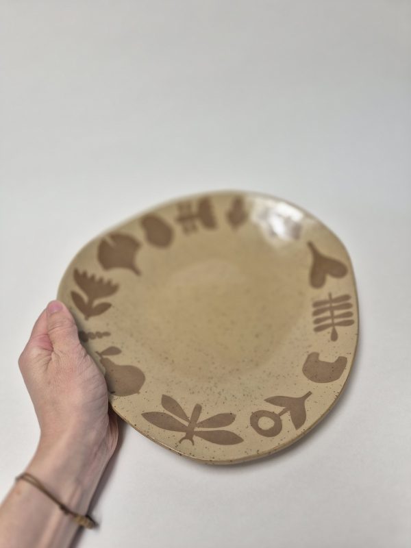 Ceramic service plate