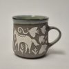 Ceramic sgraffito mug with horses