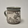 Ceramic sgraffito mug with horses