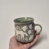 Ceramic sgraffito mug with horses
