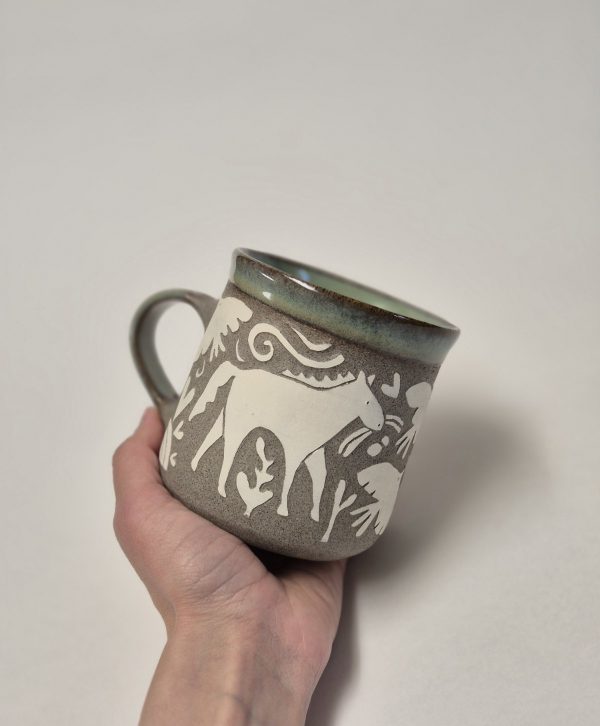 Ceramic sgraffito mug with horses