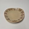 Ceramic service plate