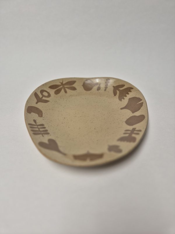 Ceramic service plate