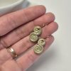Green dangle earrings