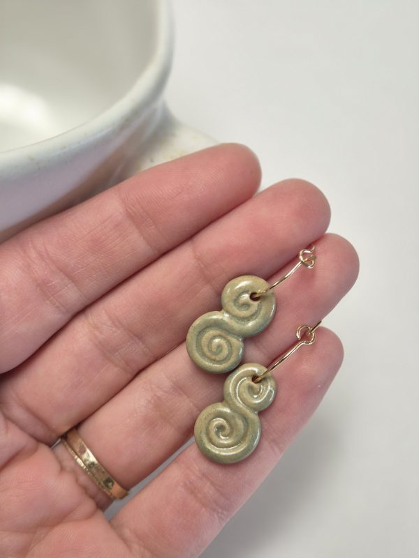 Green dangle earrings
