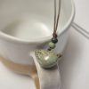 Tiny bird pendant