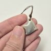 Tiny bird pendant
