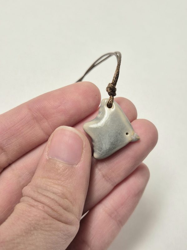 Tiny bird pendant