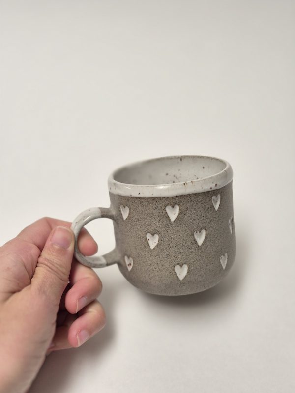 Coffee cup with hearts