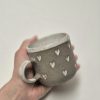 Coffee cup with hearts