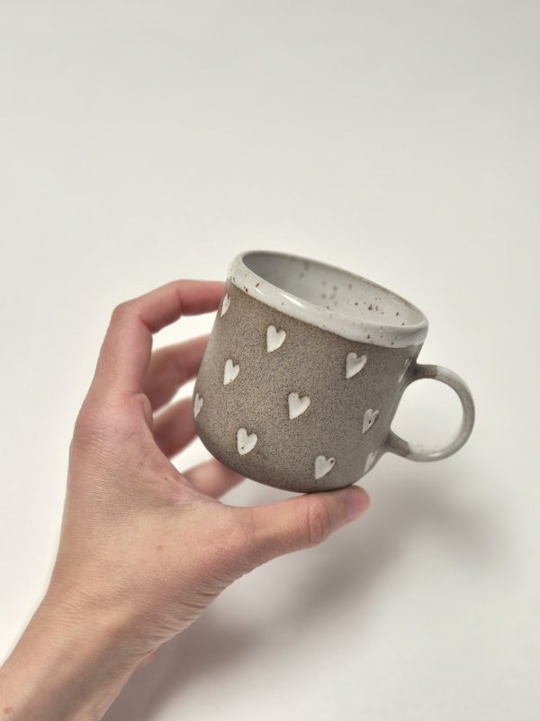 Coffee cup with hearts
