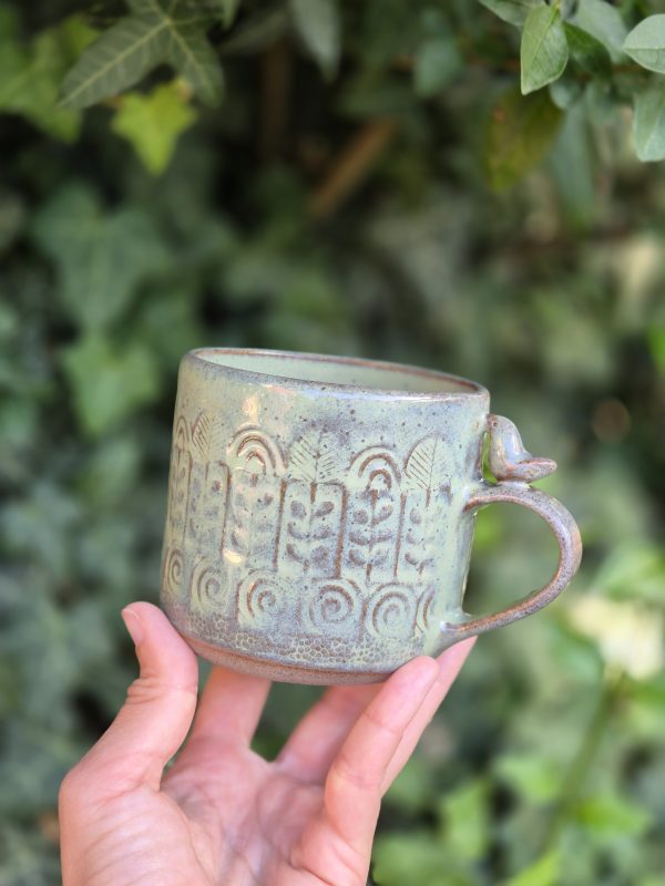 Ceramic mug with bird