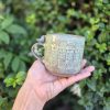 Ceramic mug with bird